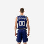Custom navy blue basketball uniform back view with player name and number printed on the navy sublimated jersey and matching shorts