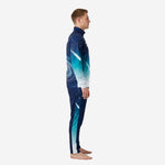 Custom navy blue soccer tracksuit showing galaxy gradient side panel and tapered pants, left side view