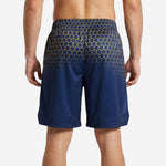 Back view of custom navy and gold basketball shorts with full sublimation hex fade pattern and solid navy lower panel