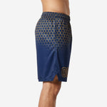 Side view of custom navy and gold basketball shorts with hex grid fade from waistband to hem and side split at leg opening