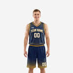 Custom navy and gold basketball uniforms front view showing starburst jersey with team name and number 00 plus matching geometric shorts on male model