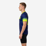 Mens navy soccer training jersey with neon yellow gradient from cuff to shoulder, right side view