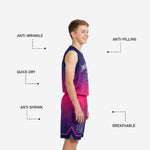 Back view of custom navy and pink boys basketball uniforms showing back number and player name placement on gradient jersey