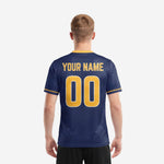 Close-up front detail of custom navy soccer jersey showing sublimated Athletic Gold team name and number on chevron stripe design