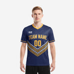 Custom navy soccer team shirts with Athletic Gold chevron stripe and front team name number print, front view on male model