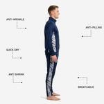 Custom navy soccer tracksuit pants detail showing marble silver side panel and ribbed ankle cuff