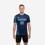 Close-up sleeve detail of custom navy soccer training jersey showing Sky Blue digital camo sublimation print on Navy Blue body