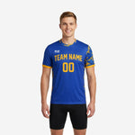 Custom navy soccer training jersey in Royal Blue with Athletic Gold camo sleeve panels and team name on chest, front view on male model