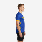 Custom navy soccer training jersey showing Athletic Gold camo side panel and sleeve cuff trim, left side view on male model
