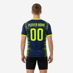 Close side detail of custom navy soccer training jersey showing edge-to-edge speed-line sublimation print and V-neck trim