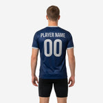 Close detail of sublimated gradient print on custom navy blue silver mens soccer training jersey showing color transition from collar to hem