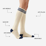 Custom navy and white soccer socks heel and toe contrast zones in navy blue with flat interior seam construction visible
