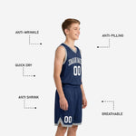 Opposite side view of custom navy youth basketball uniforms showing matching grey trim band on jersey hem and shorts leg