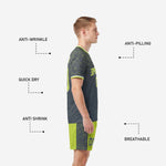 Custom neon green soccer shorts with charcoal side panels and matching geometric sublimation print