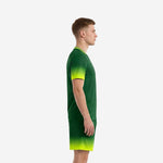 Custom neon green soccer uniform side view showing gradient fade from Forest Green chest to Neon Yellow-Green cuffs and hem