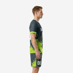 Custom neon green soccer uniforms charcoal side view showing neon green sleeve band and full sublimation print
