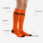 Custom orange and black soccer socks heel detail showing reinforced black cushioned zone inside the boot