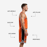 Back view of the orange basketball uniform set showing player name and number placement on the jersey and shorts