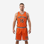 Custom orange basketball uniform with black side panels and white trim showing front and back views of the full jersey and shorts set