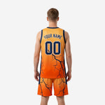 Back view of custom orange basketball uniform showing player name and number placement on sublimated jersey and shorts