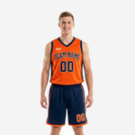 Custom orange basketball uniform with navy side panels, arched team name and number 00 on front, matching navy shorts with orange stripe, men's full set front view