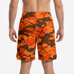 Opposite side view of custom orange and brown camo basketball shorts with sublimated cracked-earth pattern and elastic waistband detail