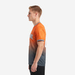 Back detail of orange and charcoal custom soccer jersey displaying player name and back number in white sublimated print