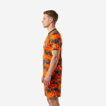 Custom orange and charcoal digital camo soccer uniform right side view showing sleeve and shorts detail