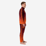 Custom orange soccer tracksuit side view showing gradient fade from maroon shoulder to orange hem with contrast stripe panels