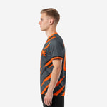 Custom orange soccer jersey right side view displaying Athletic Orange cuff trim and full-dye sublimation slash-stripe design