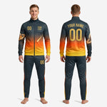 Full 2-piece custom orange soccer tracksuit set back view showing name and number print zones