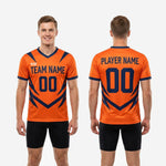 V-neck collar detail on custom orange soccer training jersey showing navy blue trim and sublimated edge-to-edge print
