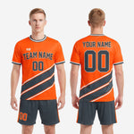 Back view of custom orange soccer uniform showing player name and number sublimated print zones