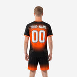 Detail view of custom orange soccer uniform crew neckline with white double-stripe trim and sublimated gradient print