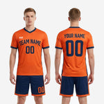 Custom orange soccer uniform full kit back view showing player name and number print zones