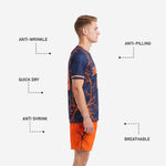 Custom orange soccer shorts detail from navy and orange soccer uniform set with matching sublimated lightning graphic