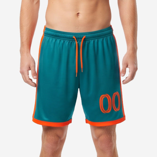 Custom orange soccer shorts with teal body and orange contrast side panels, player number 00 on left leg, mens athletic fit