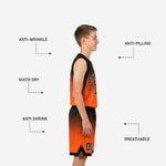 Back view of custom orange and black youth basketball uniforms showing back number and player name sublimated on gradient jersey