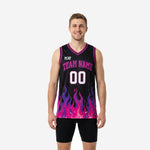 Custom pink basketball jerseys in black with full-panel pink and purple flame sublimation print showing front and back views on a male model