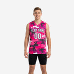 Custom pink basketball jerseys with full-body pink and black camo pattern, team name and number 00 on the front, V-neck with pink binding