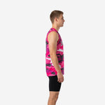 Side view of custom pink basketball jerseys showing full camo sublimation across all panels and straight hem at hip length