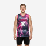 Custom pink basketball jerseys with electric pink lightning storm on dark gray, showing team name and number 00 on the front, modeled by an adult male player