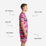 Pink and charcoal digital camo soccer shorts detail showing matching sublimated pattern and player number on left leg