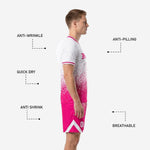 Custom pink soccer shorts with white chevron leg panel and sublimated dot-burst gradient, player number 10 on lower left thigh