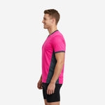 Hot pink soccer training jersey with charcoal trim on sleeve cuff and side panel, right side view