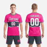 Custom pink and charcoal soccer uniform full kit back view showing player name and number print zones
