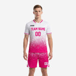 Custom pink soccer uniforms in hot pink and white dot-burst gradient, front view showing team name and number on jersey with matching shorts