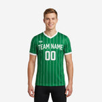 Custom pinstripe soccer training jersey in Kelly Green and White with team name and number on chest, front view on male model