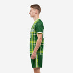 Sublimated futbol uniform set in forest green and lime plaid, right side view showing back panel