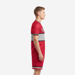 Custom plain soccer uniform Crimson Red jersey and shorts side view showing dot-burst mid-chest band and sleeve trim